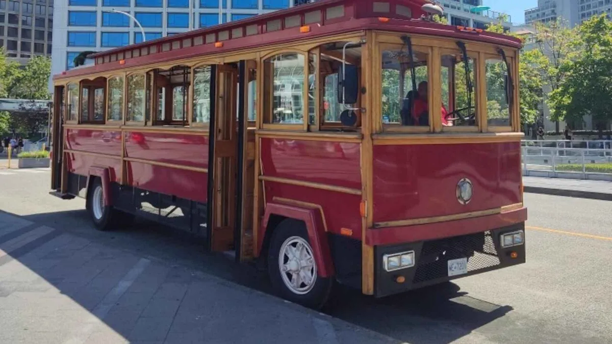 Green Gray Line trolley bus at the Stanley Park Pavilion stop, Vancouver hop-on hop-off trolley tour pass